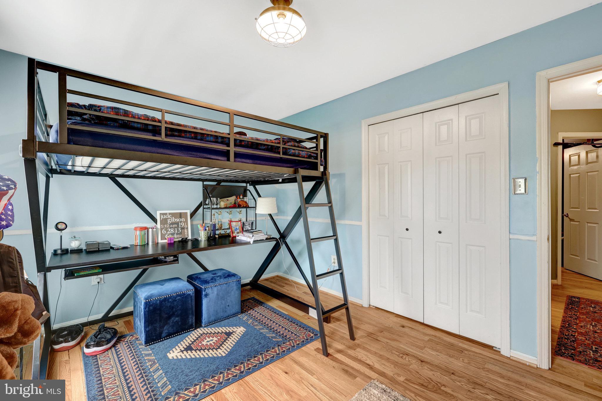 44116 Bristow Circle Ashburn, VA 20147 - Photo 46 of 79 a view of a room with wooden floor and furniture