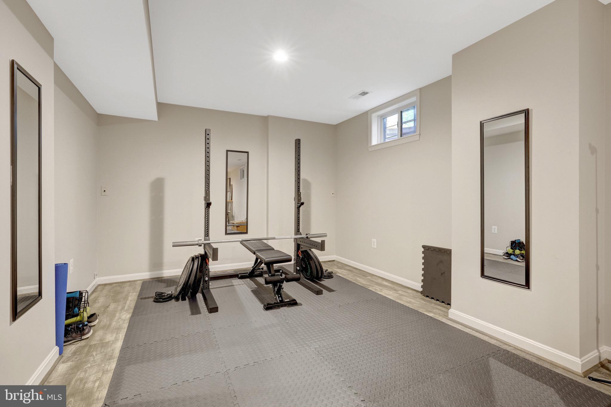 44116 Bristow Circle Ashburn, VA 20147 - Photo 57 of 79 a view of a workspace with furniture and a window