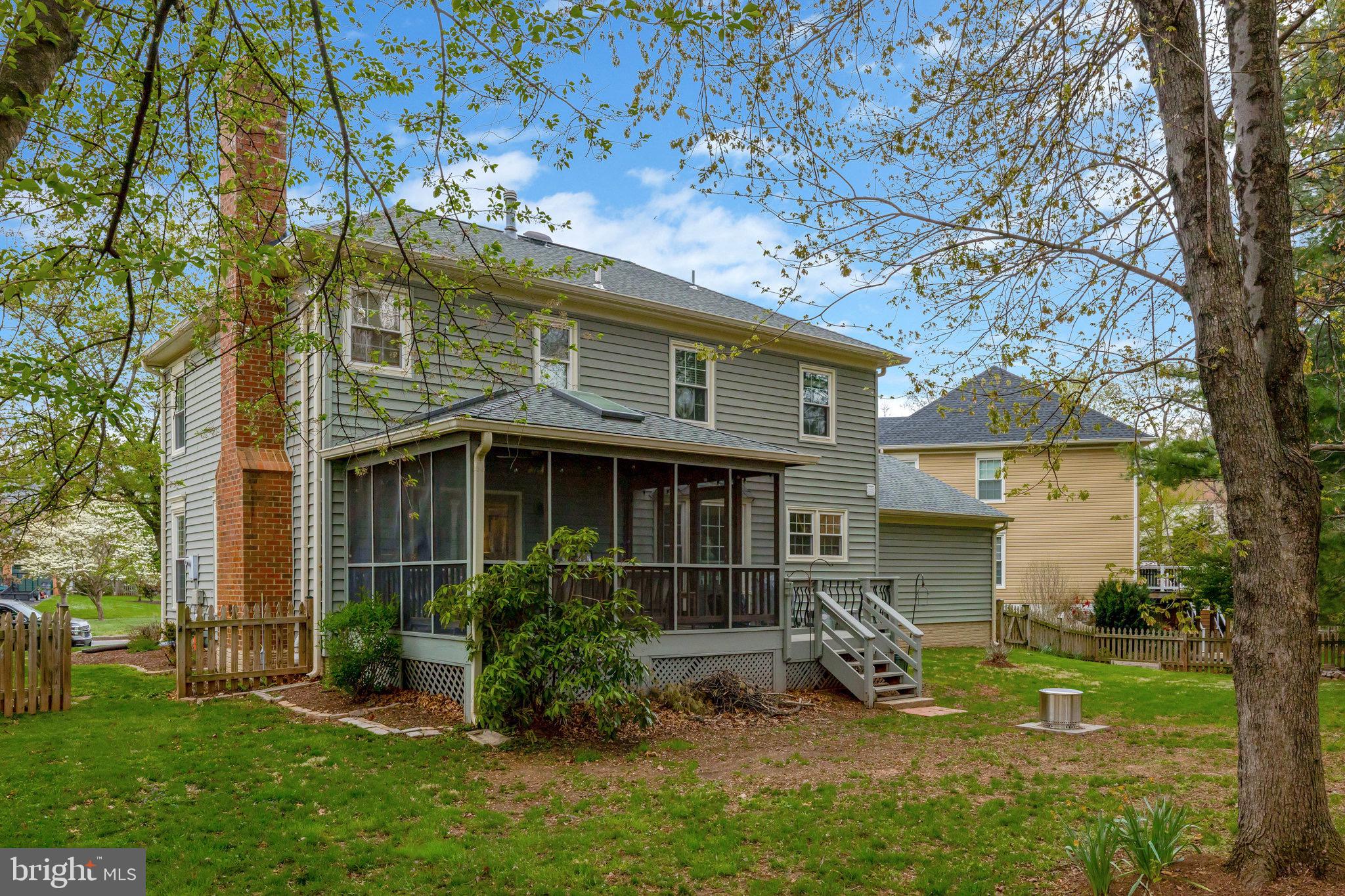 44116 Bristow Circle Ashburn, VA 20147 - Photo 67 of 79 a view of a house with backyard garden and sitting area