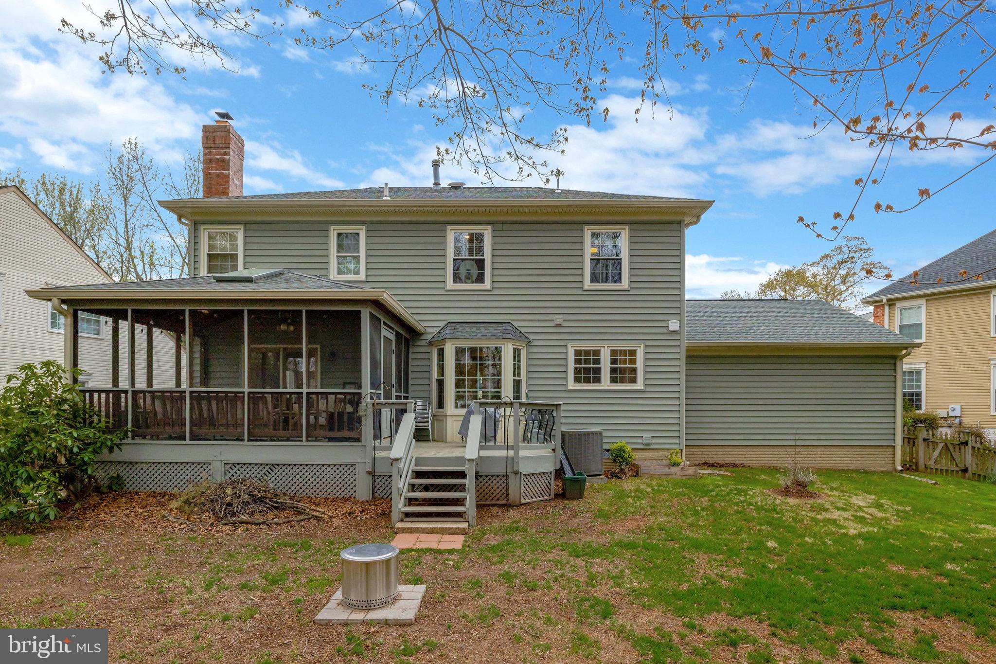 44116 Bristow Circle Ashburn, VA 20147 - Photo 68 of 79 a front view of a house with a garden