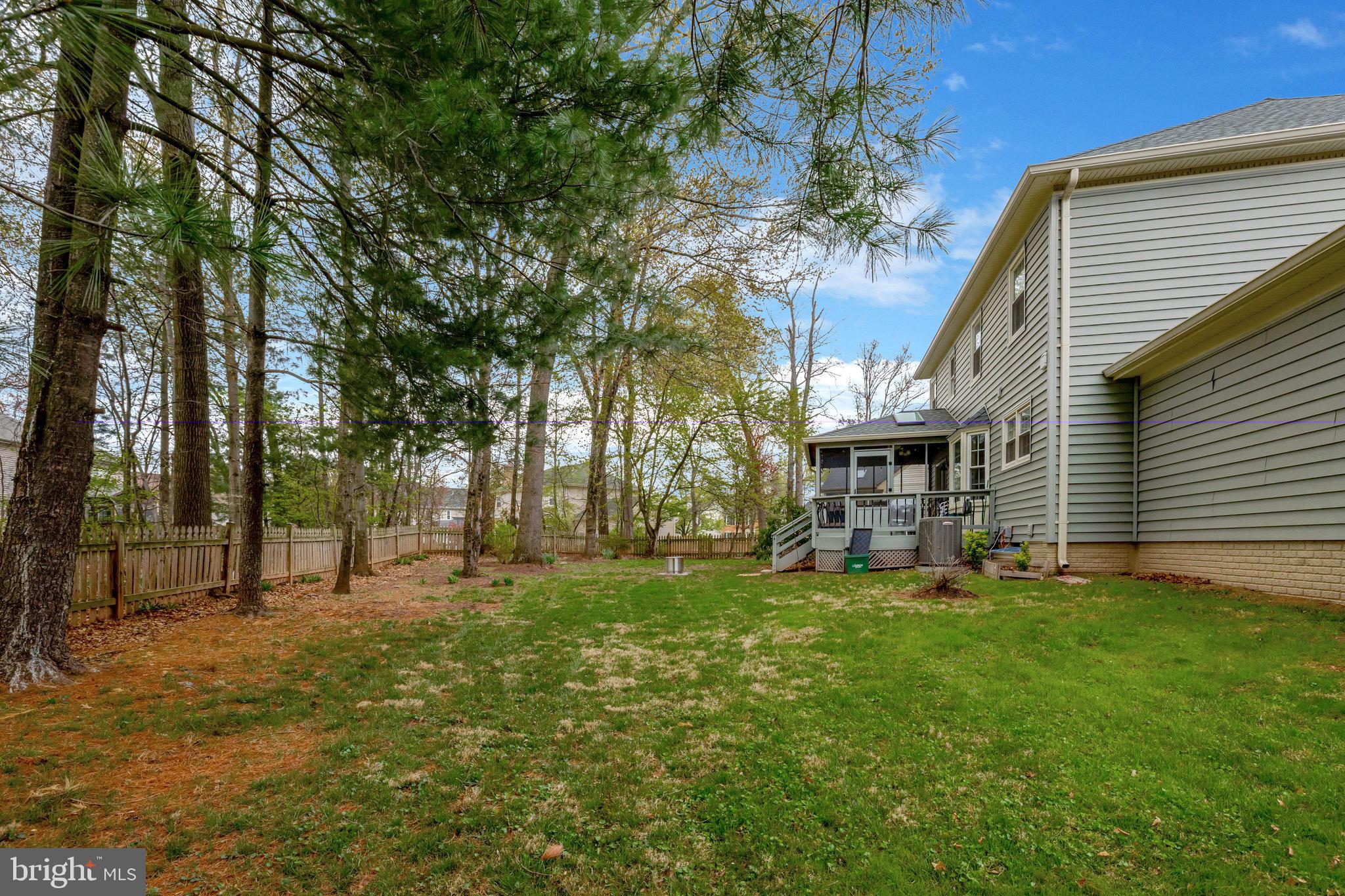 44116 Bristow Circle Ashburn, VA 20147 - Photo 76 of 79 a view of a house with a yard