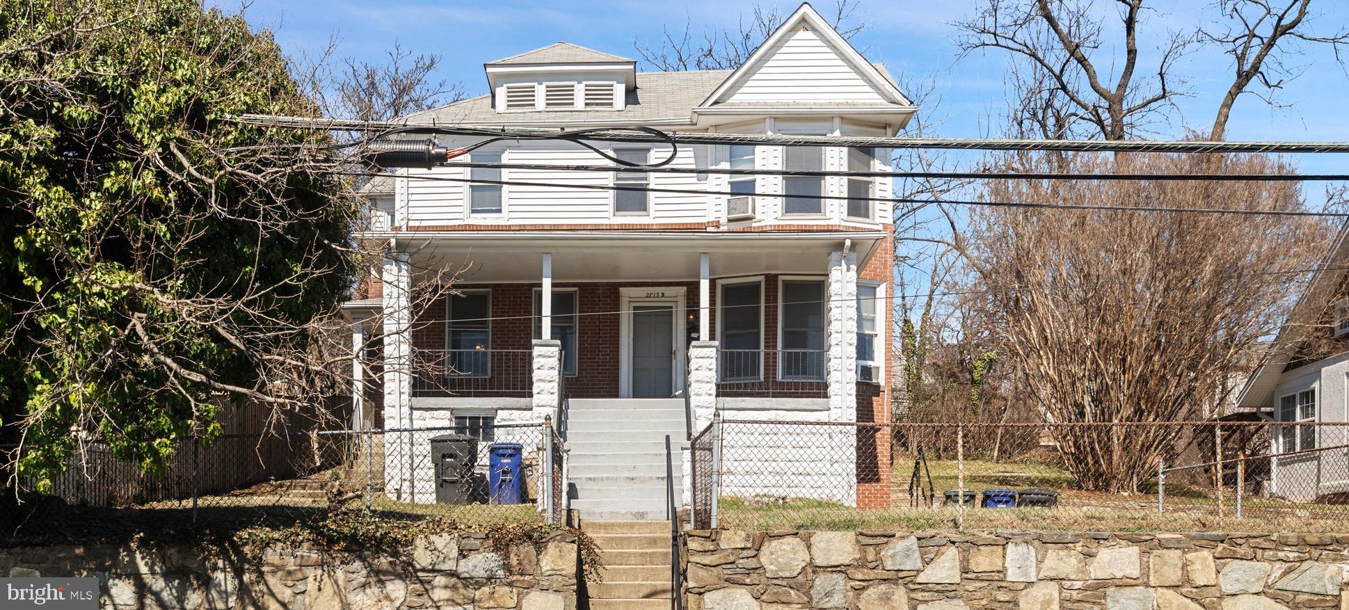front view of a house with a small yard