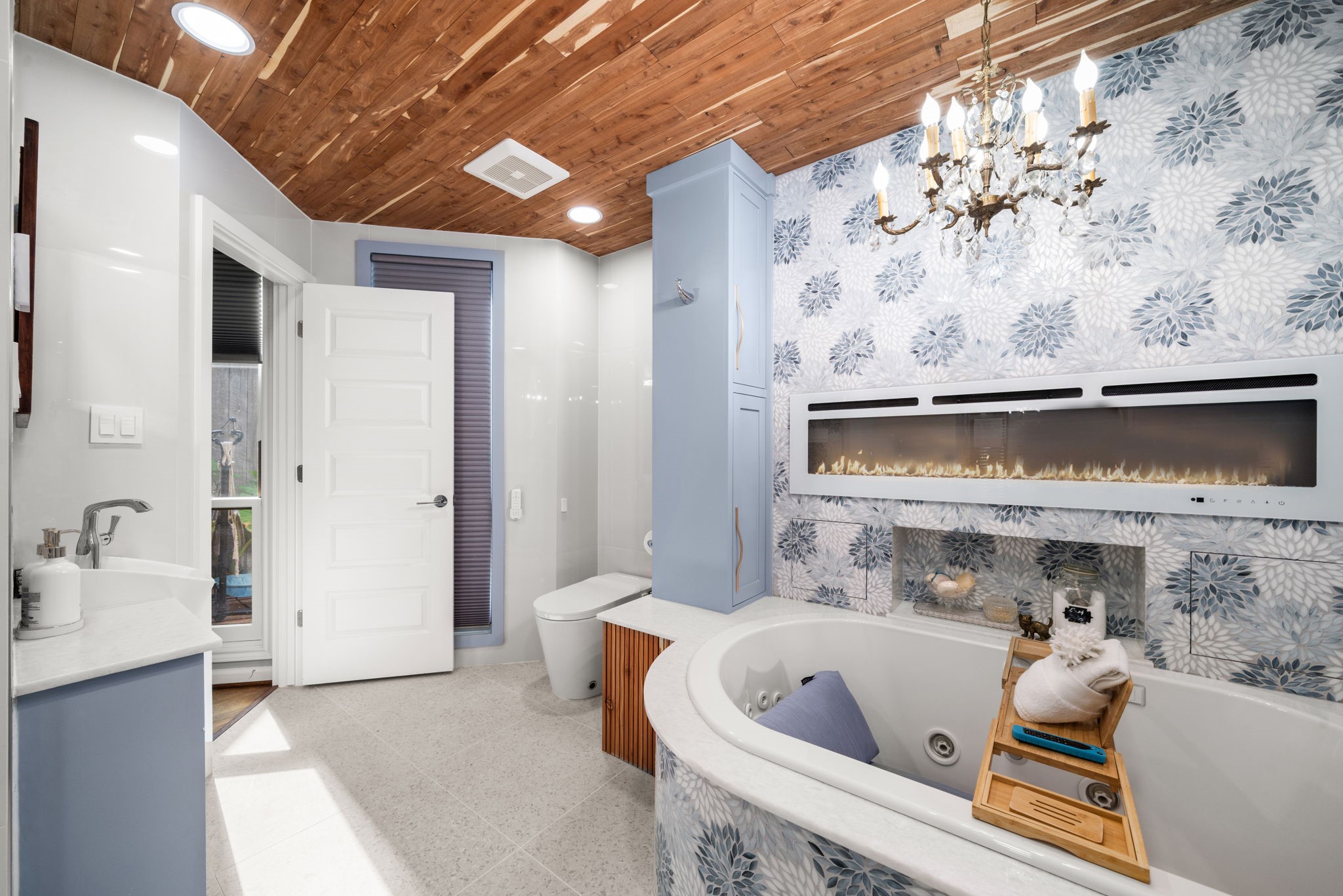 1011 Barkdull Street Houston, TX 77006 - Photo 12 of 40 The primary bathroom belongs on a magazine cover. The jetted soaking tub with fireplace provides the ultimate relaxation after a long day in the city.