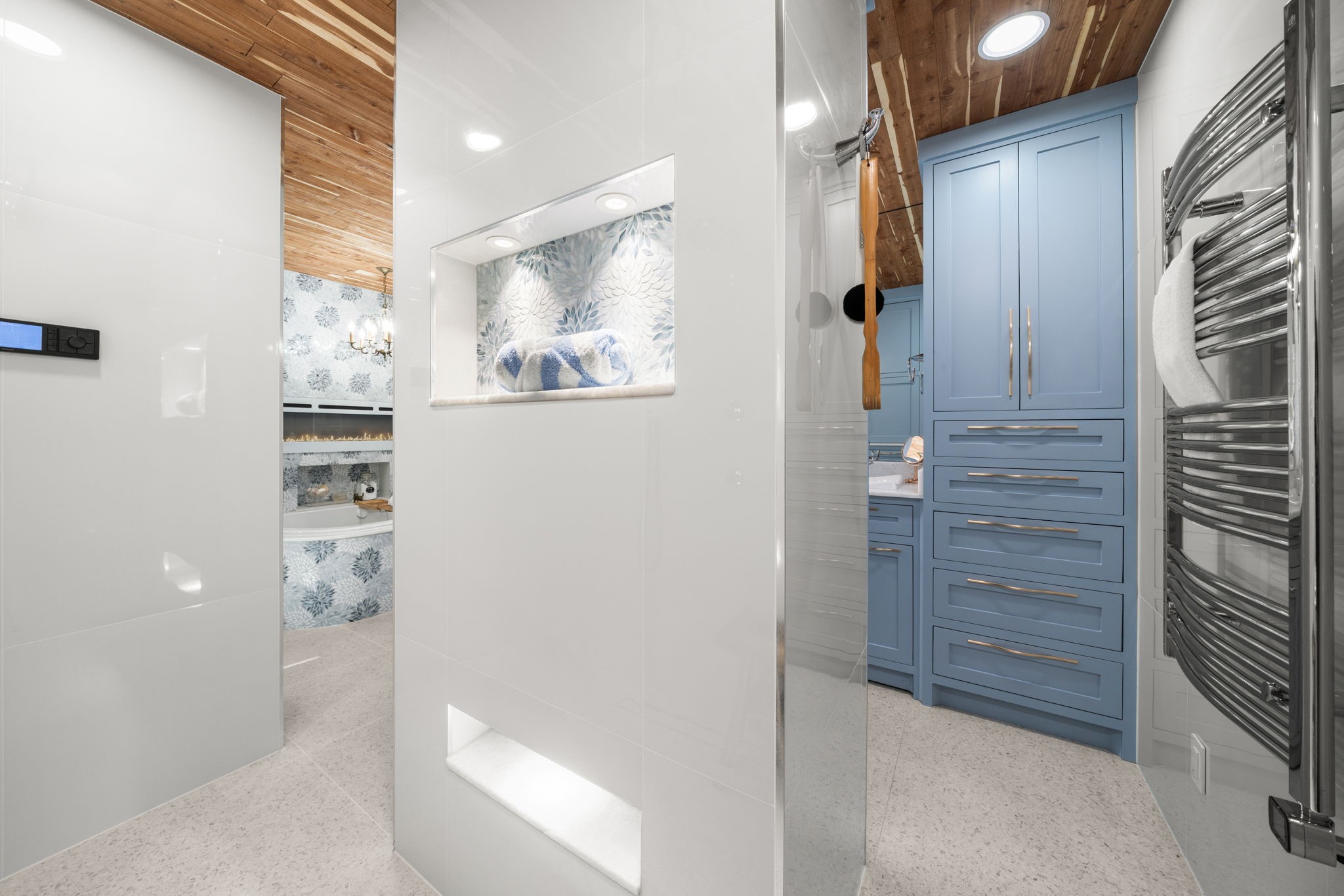 1011 Barkdull Street Houston, TX 77006 - Photo 13 of 40 Resort style shower with multiple shower heads electronically controlled for the ultimate shower experience. Shower is Alexa and Google compatible! You can run the shower and get it hot before you leave the bed!! Then grab a warm towel to the right and start your day.