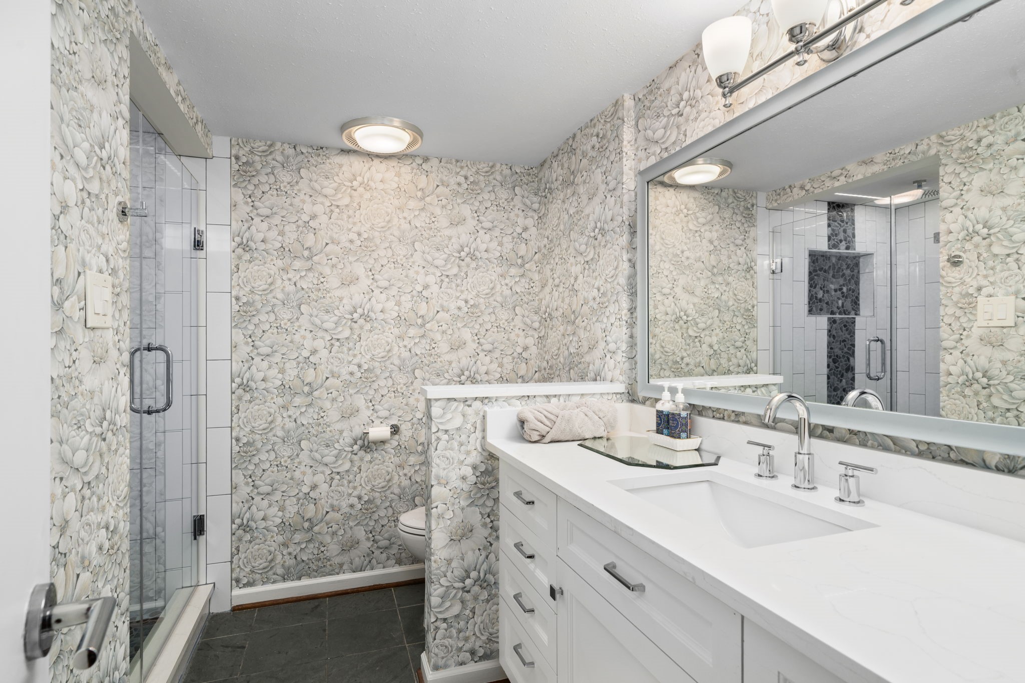 1011 Barkdull Street Houston, TX 77006 - Photo 16 of 40 Secondary bedroom ensuite bath has been recently remodeled with luxury finishes.