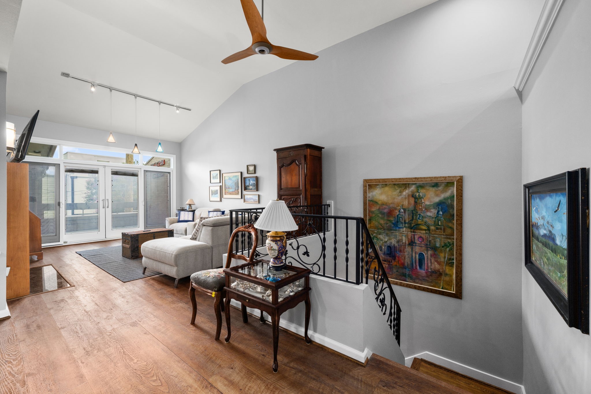 1011 Barkdull Street Houston, TX 77006 - Photo 38 of 40 Centrally located staircase adds to the open floor plan.