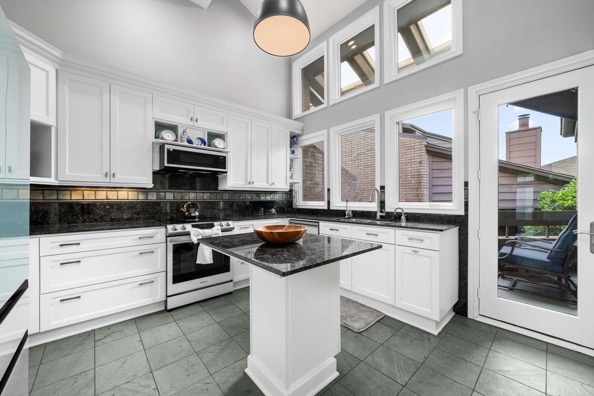 1011 Barkdull Street Houston, TX 77006 - Photo 24 of 40 Island kitchen was recently updated. New appliances and great views will make this a favorite area of the house.