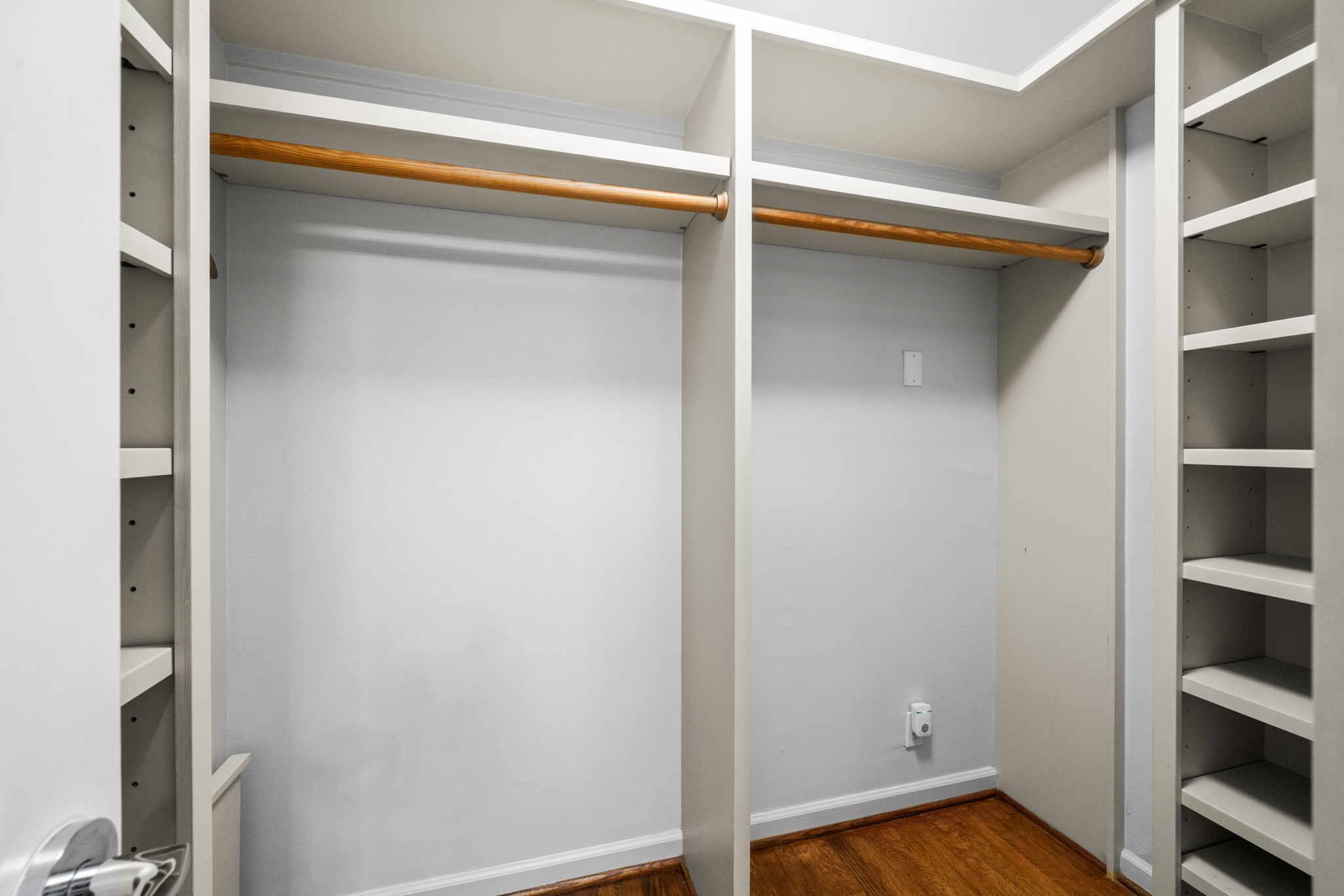 1011 Barkdull Street Houston, TX 77006 - Photo 10 of 40 Primary bedroom closet has custom organization.