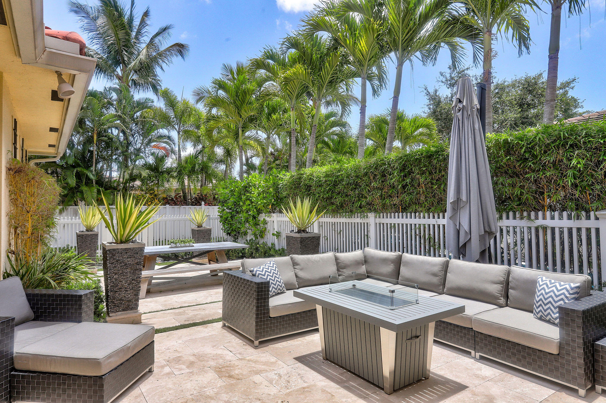 147 Killarney Court Jupiter, FL 33458 - Photo 40 of 68 a building outdoor space with patio furniture