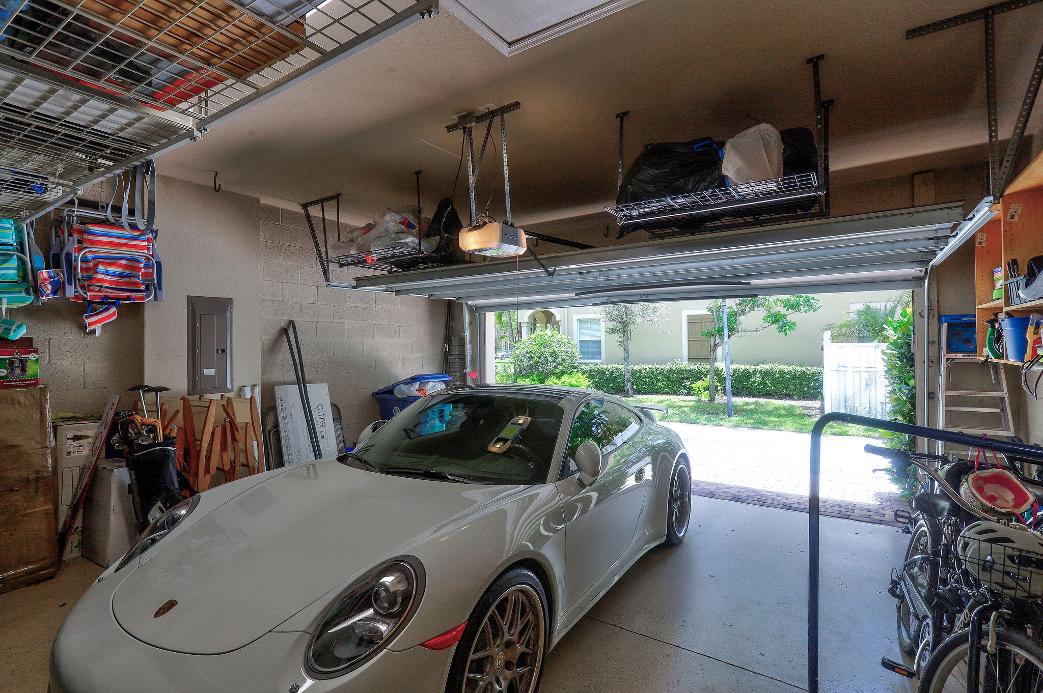147 Killarney Court Jupiter, FL 33458 - Photo 49 of 68 a car parked in a parking garage