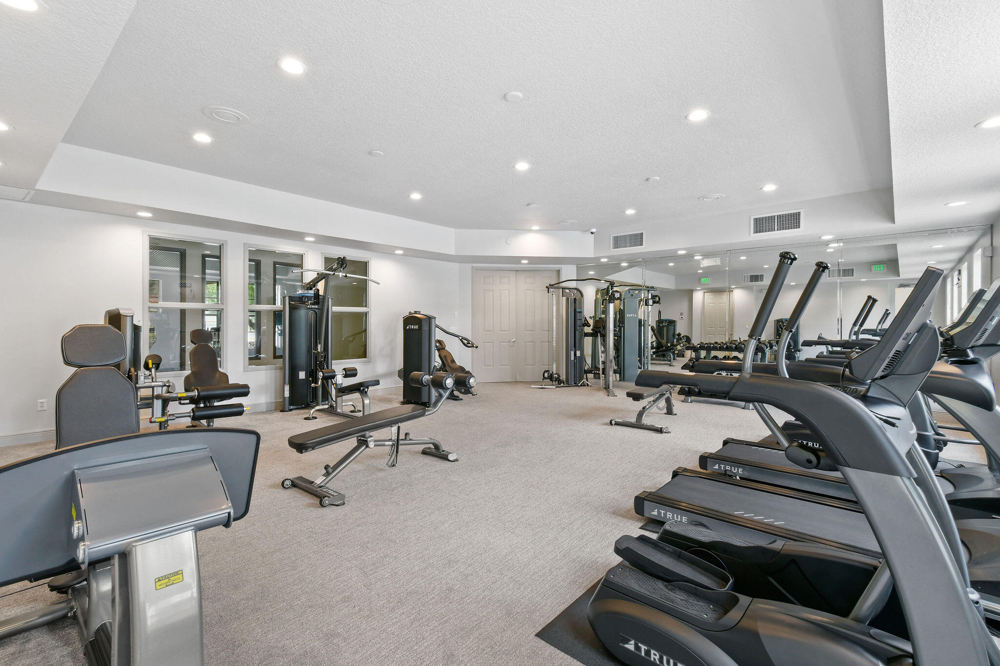 147 Killarney Court Jupiter, FL 33458 - Photo 60 of 68 a view of a room with gym equipment