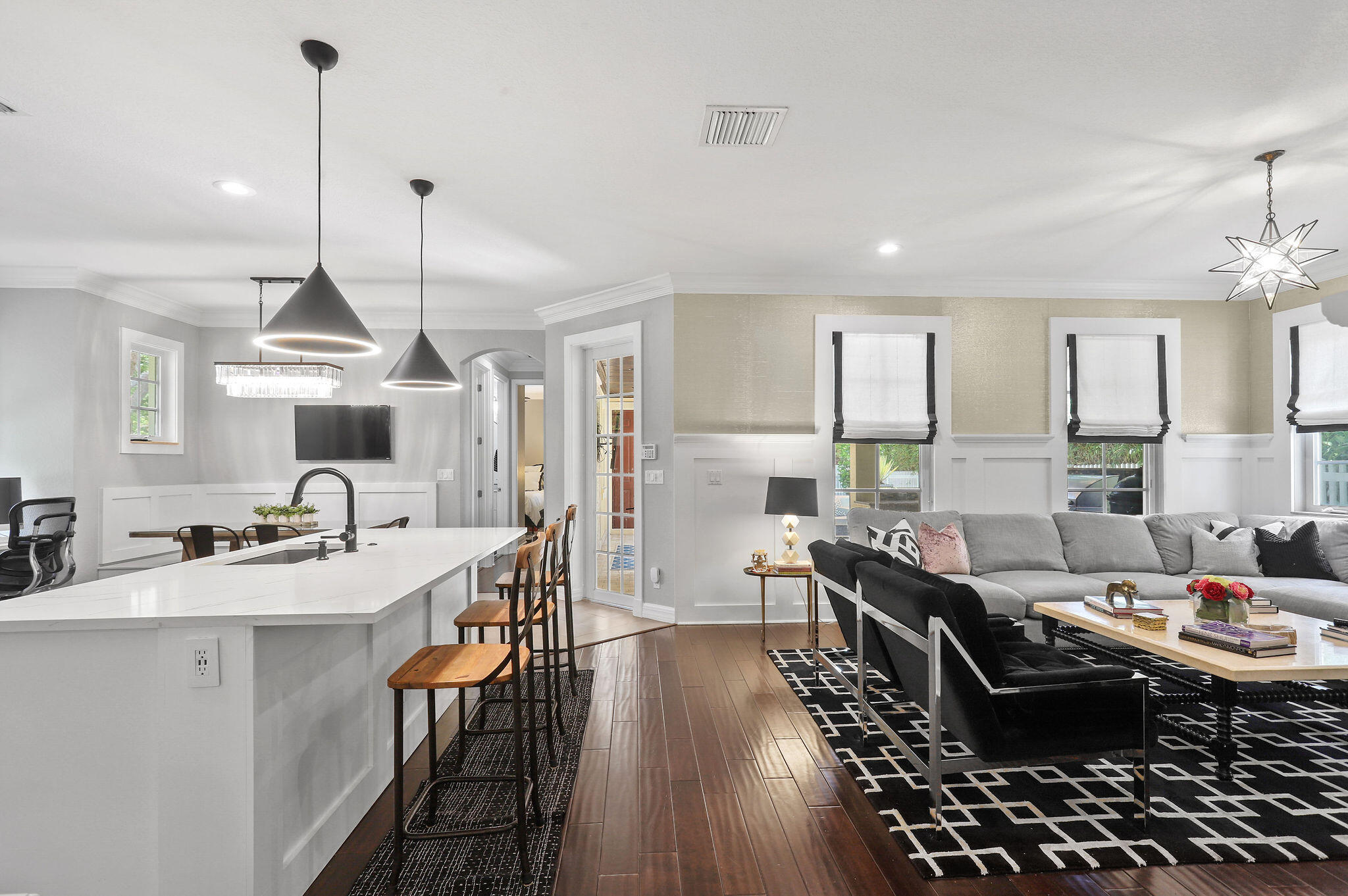 147 Killarney Court Jupiter, FL 33458 - Photo 8 of 68 a kitchen with stainless steel appliances kitchen island granite countertop a sink stove and cabinets