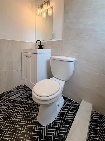 a bathroom with a sink and a toilet
