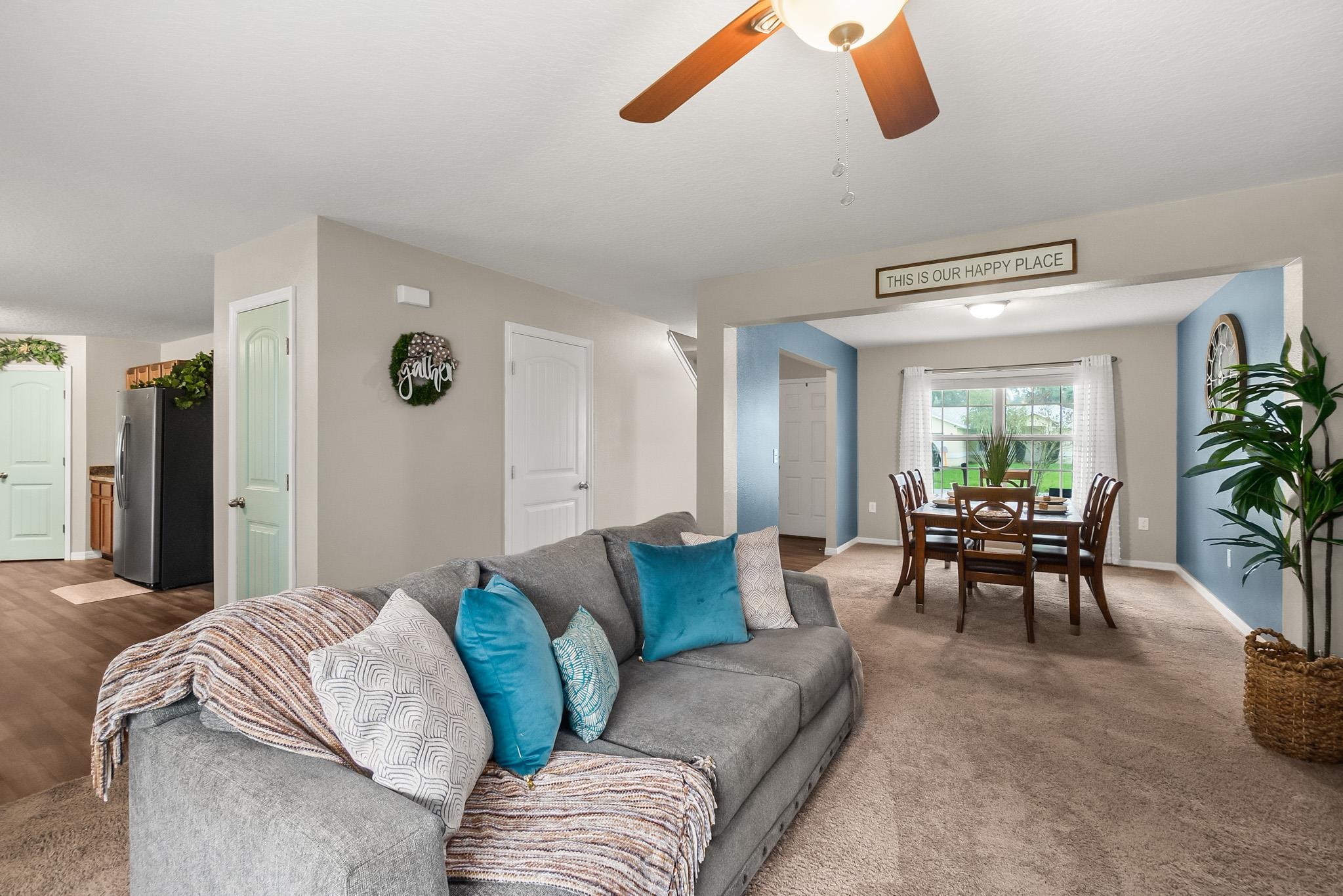 10 Pickcane Lane Palm Coast, FL 32164 - Photo 9 of 43 a living room with furniture and a large window
