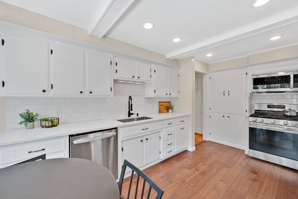 3 Mark Road Wilbraham, MA 01095 - Photo 12 of 39 a kitchen with stainless steel appliances a stove refrigerator sink and microwave