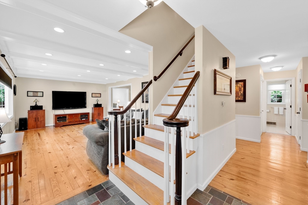 3 Mark Road Wilbraham, MA 01095 - Photo 14 of 39 a living room with wooden floor and a flat screen tv