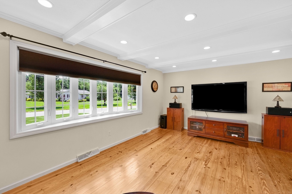 3 Mark Road Wilbraham, MA 01095 - Photo 16 of 39 a living room with a flat screen tv and a large window
