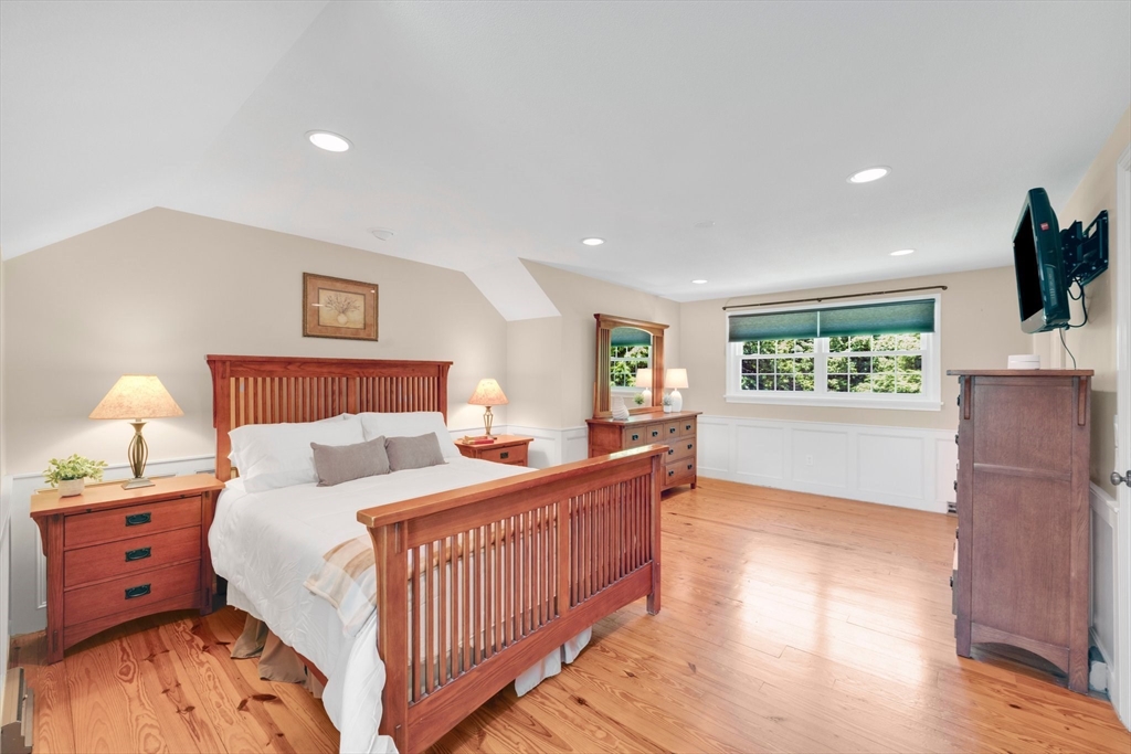 3 Mark Road Wilbraham, MA 01095 - Photo 30 of 39 a bedroom with a bed and wooden floor