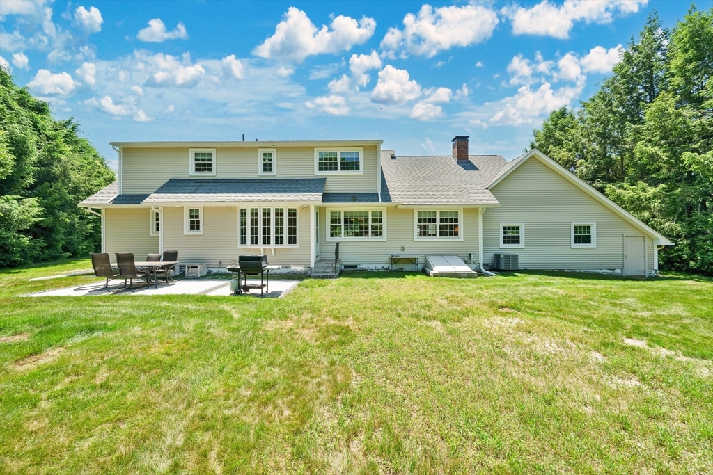 3 Mark Road Wilbraham, MA 01095 - Photo 37 of 39 a front view of a house with a garden