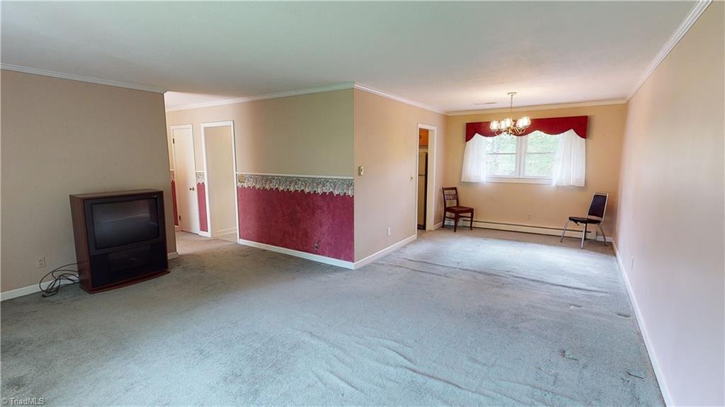 211 West Greenhill Road Mount Airy, NC 27030 - Photo 7 of 25 Upper Living Room looking into Dining Room