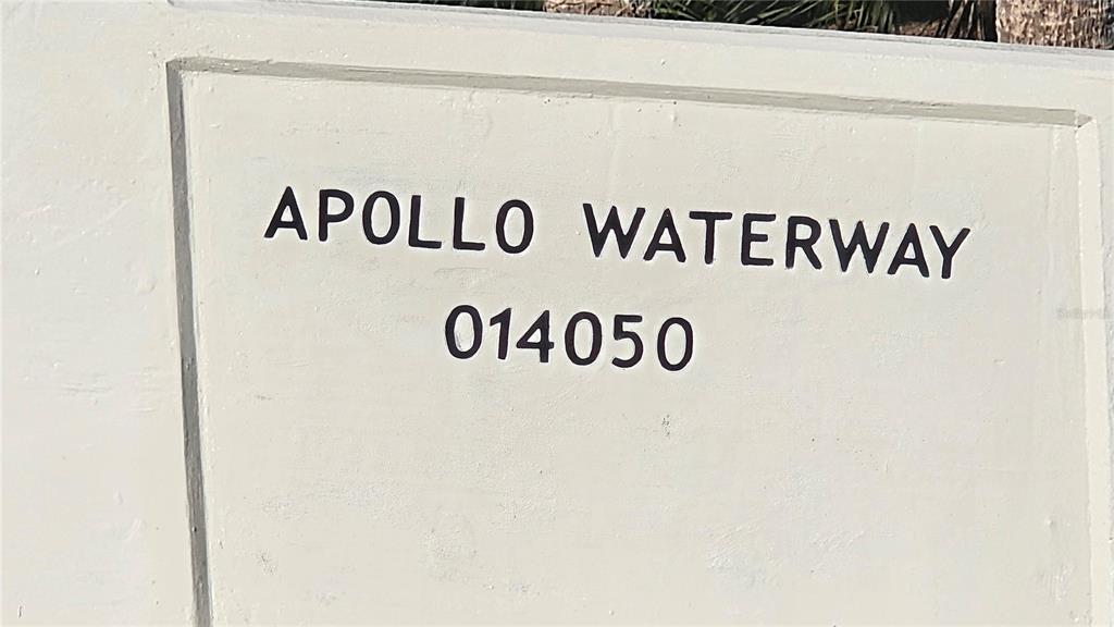 1253 Casper Street Port Charlotte, FL 33953 - Photo 10 of 13 a close up of a street sign