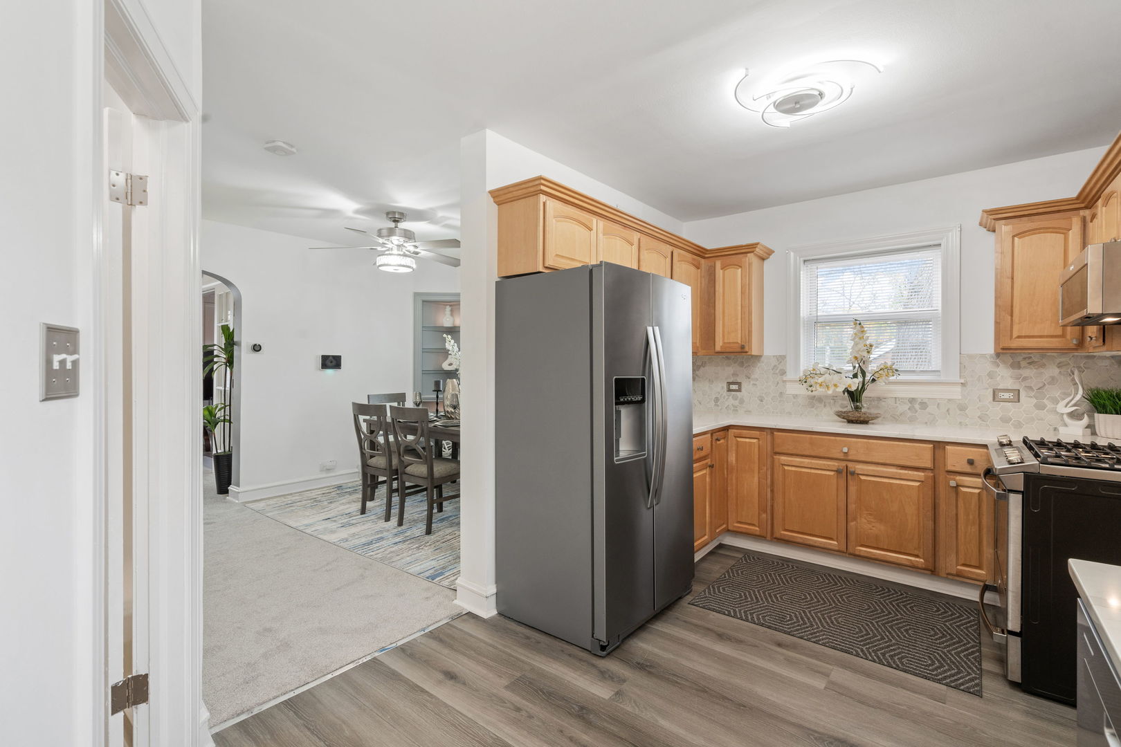 1600 Pine Road Homewood, IL 60430 - Photo 11 of 28 a kitchen with stainless steel appliances a refrigerator sink and cabinets