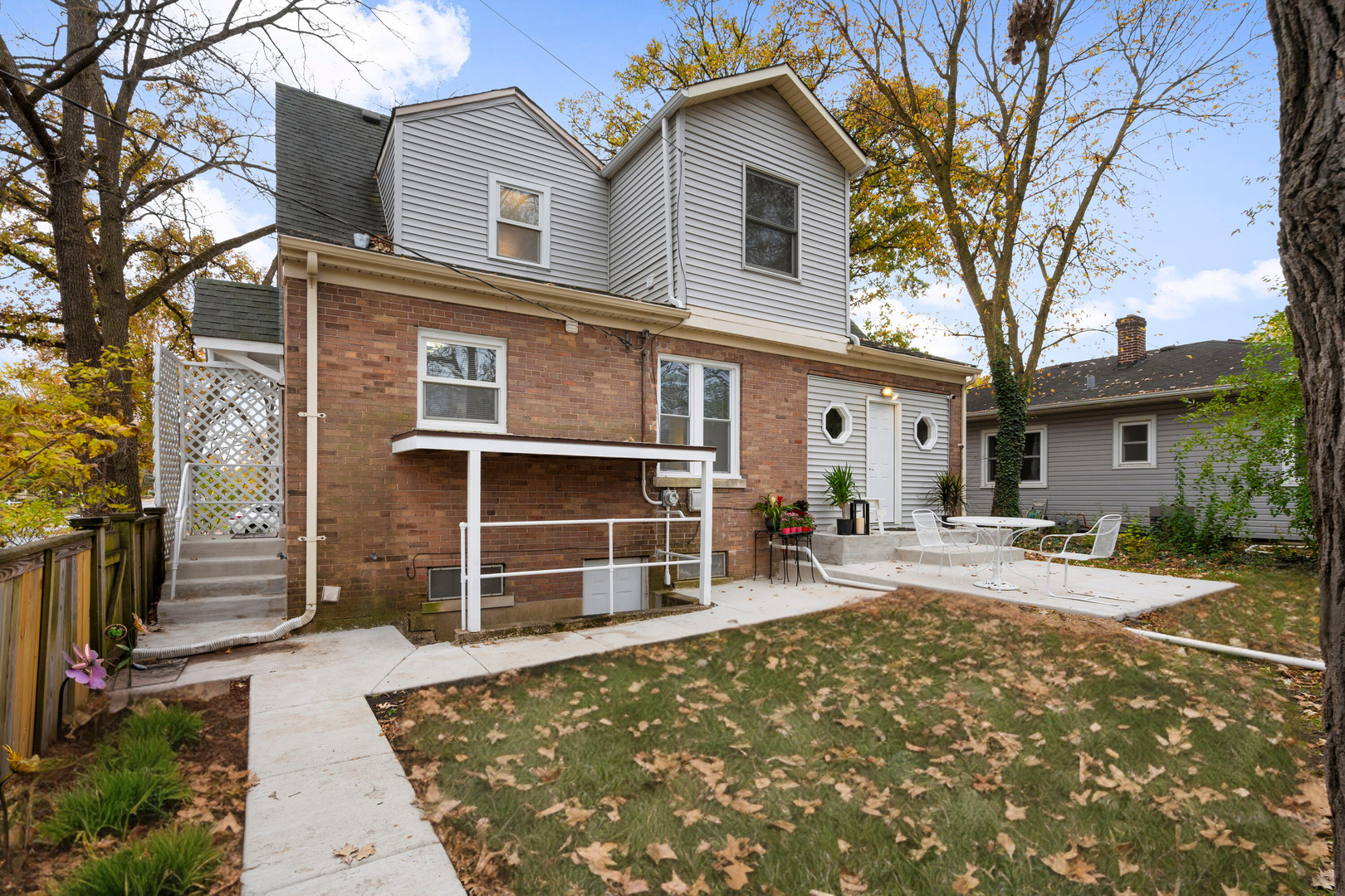 1600 Pine Road Homewood, IL 60430 - Photo 24 of 28 a front view of a house with a yard and garage