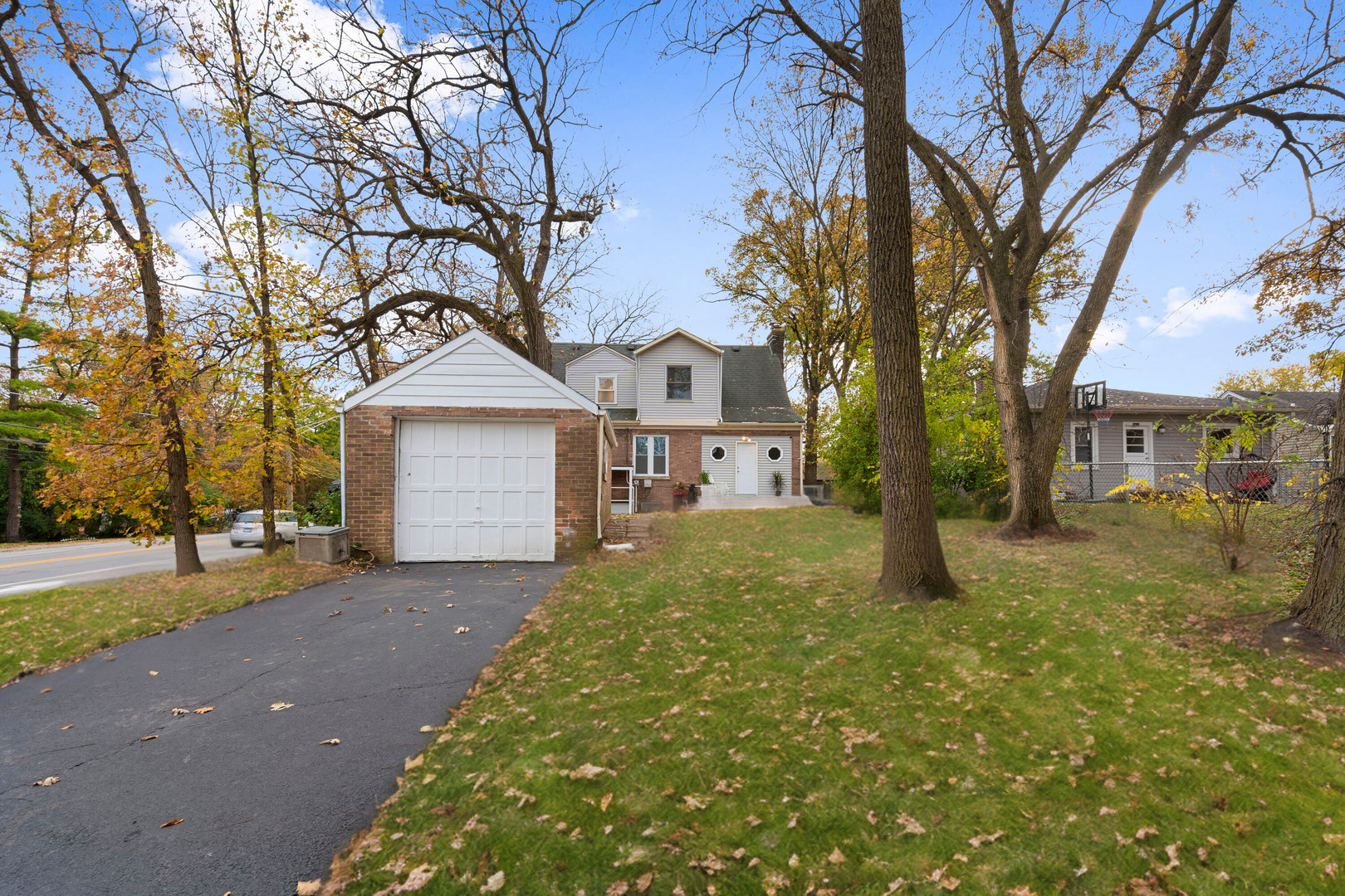 1600 Pine Road Homewood, IL 60430 - Photo 25 of 28 a view of a yard with a house and a large tree