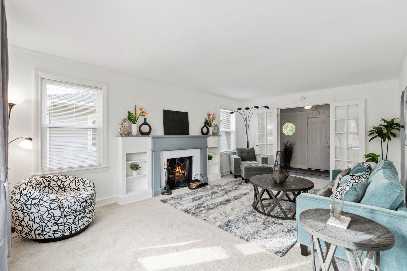 1600 Pine Road Homewood, IL 60430 - Photo 3 of 28 a living room with furniture a fireplace and a flat screen tv