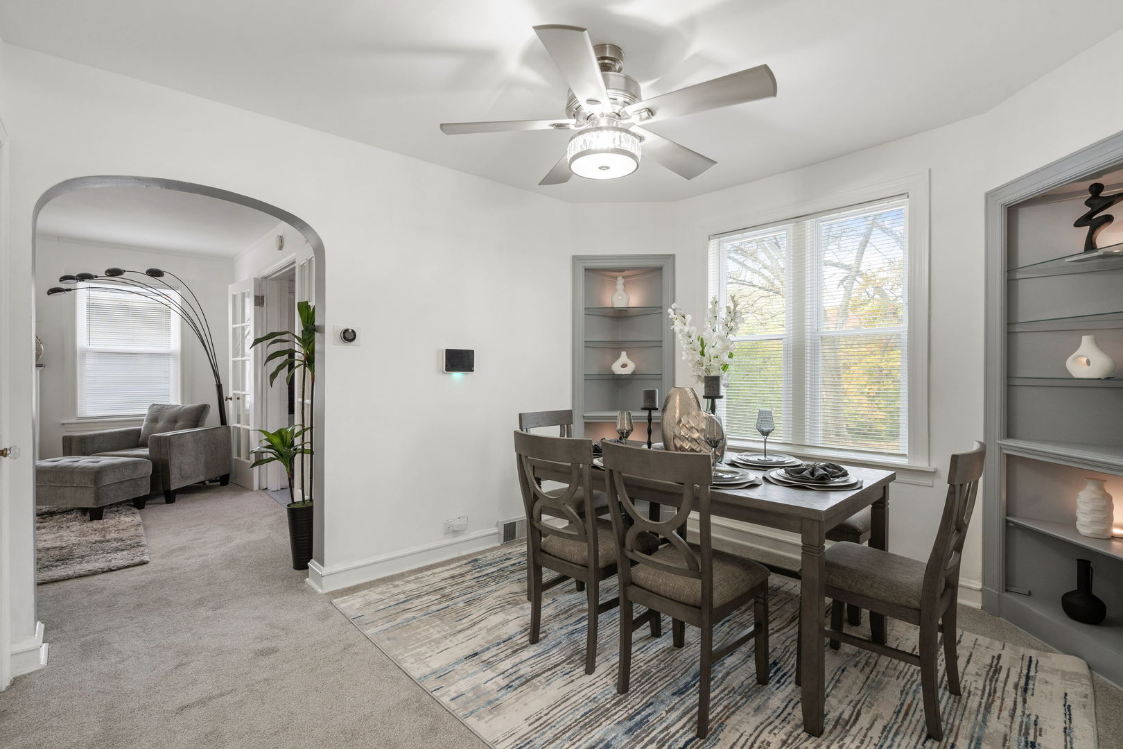 1600 Pine Road Homewood, IL 60430 - Photo 7 of 28 a view of a dining room with furniture and a chandelier