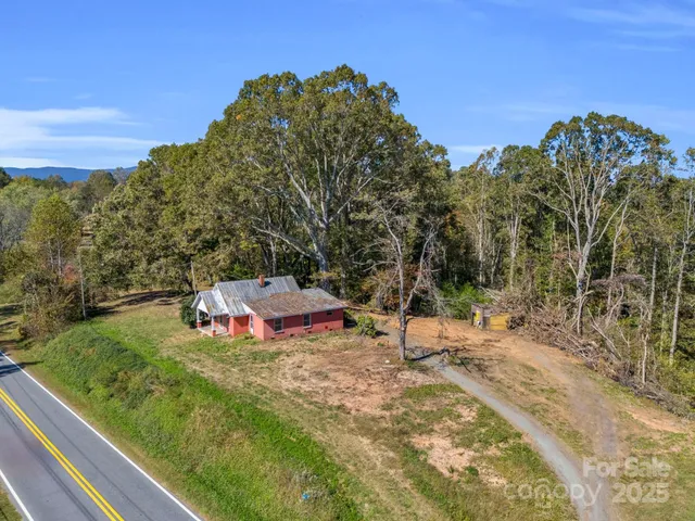 a view of a backyard with a patio