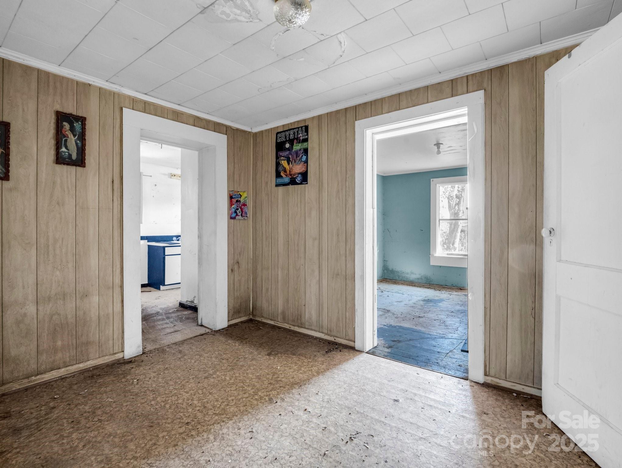 6271 Highway 108 Mill Spring, NC 28756 - Photo 12 of 35 wooden floor and a bathroom with mirror