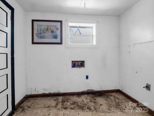 a view of an empty room with window