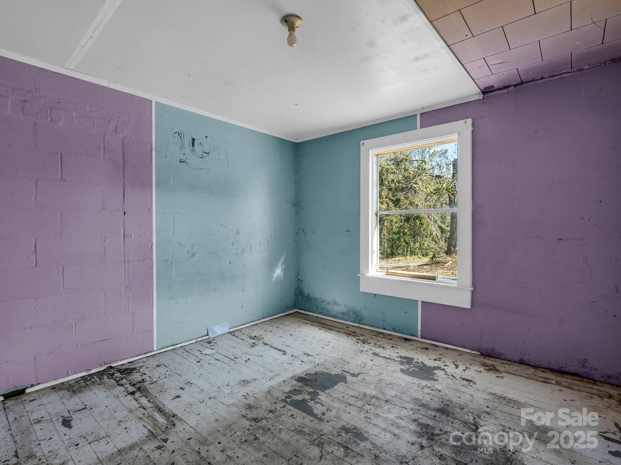 6271 Highway 108 Mill Spring, NC 28756 - Photo 16 of 35 a view of an empty room with window