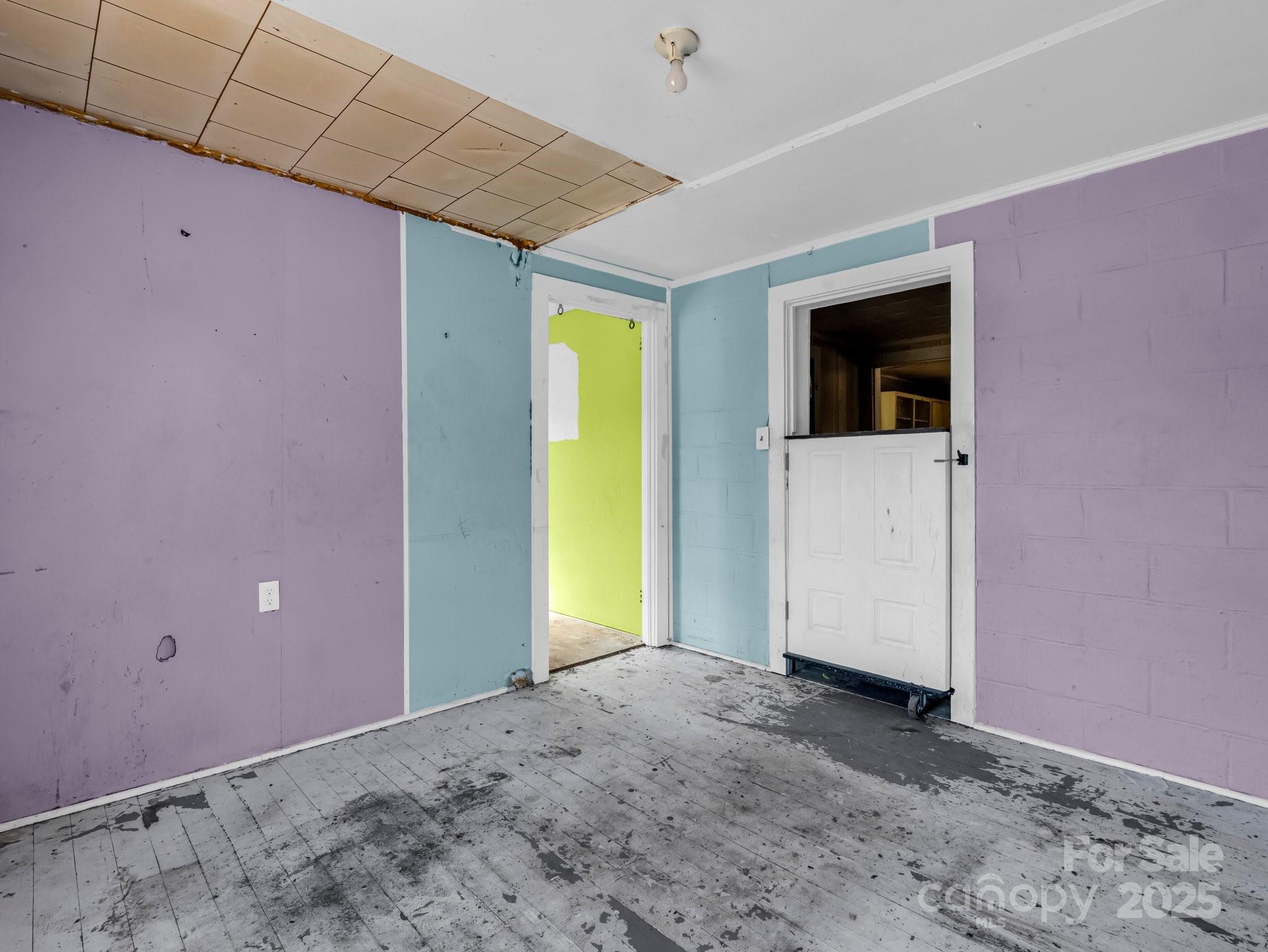 6271 Highway 108 Mill Spring, NC 28756 - Photo 17 of 35 a view of a livingroom with a flat screen tv
