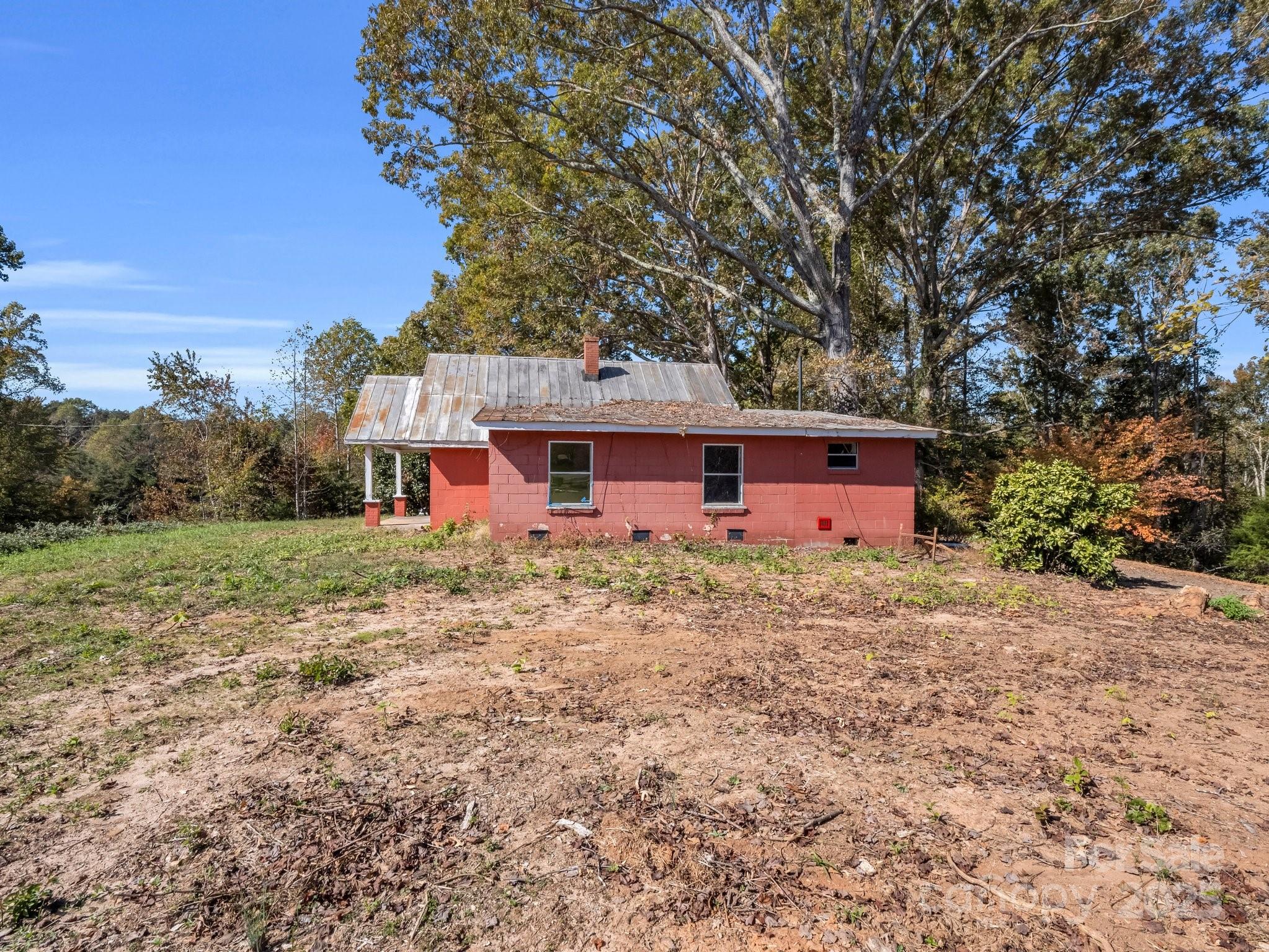 6271 Highway 108 Mill Spring, NC 28756 - Photo 23 of 35 a view of a house with backyard