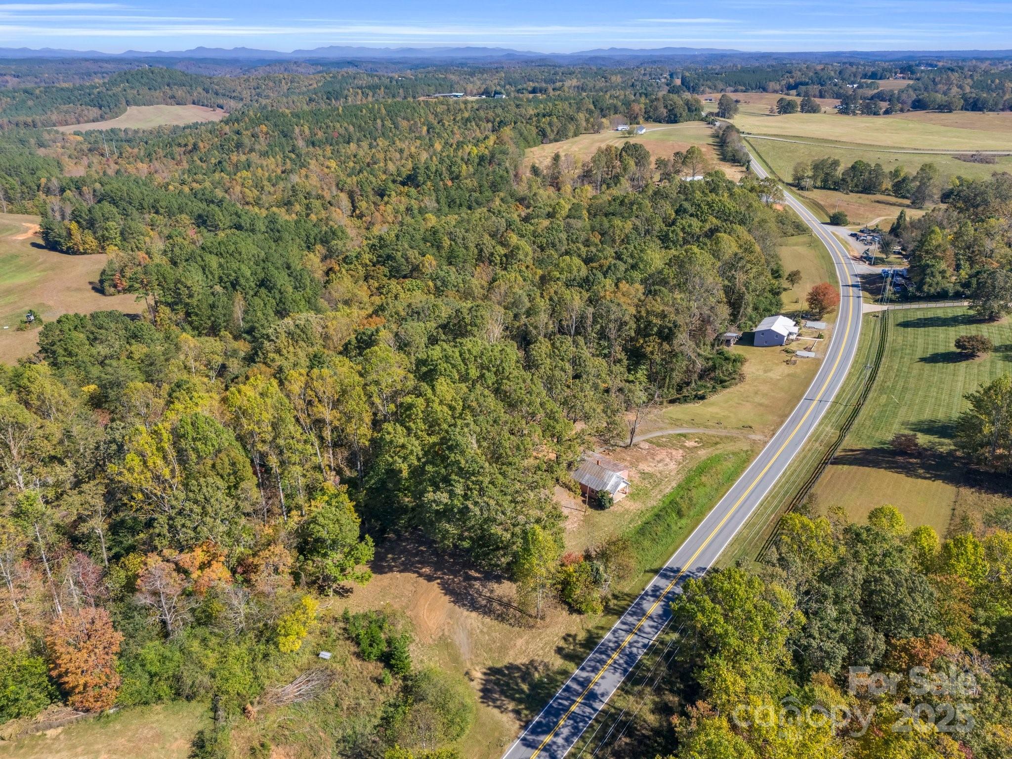 6271 Highway 108 Mill Spring, NC 28756 - Photo 28 of 35 view of a lake with a mountain