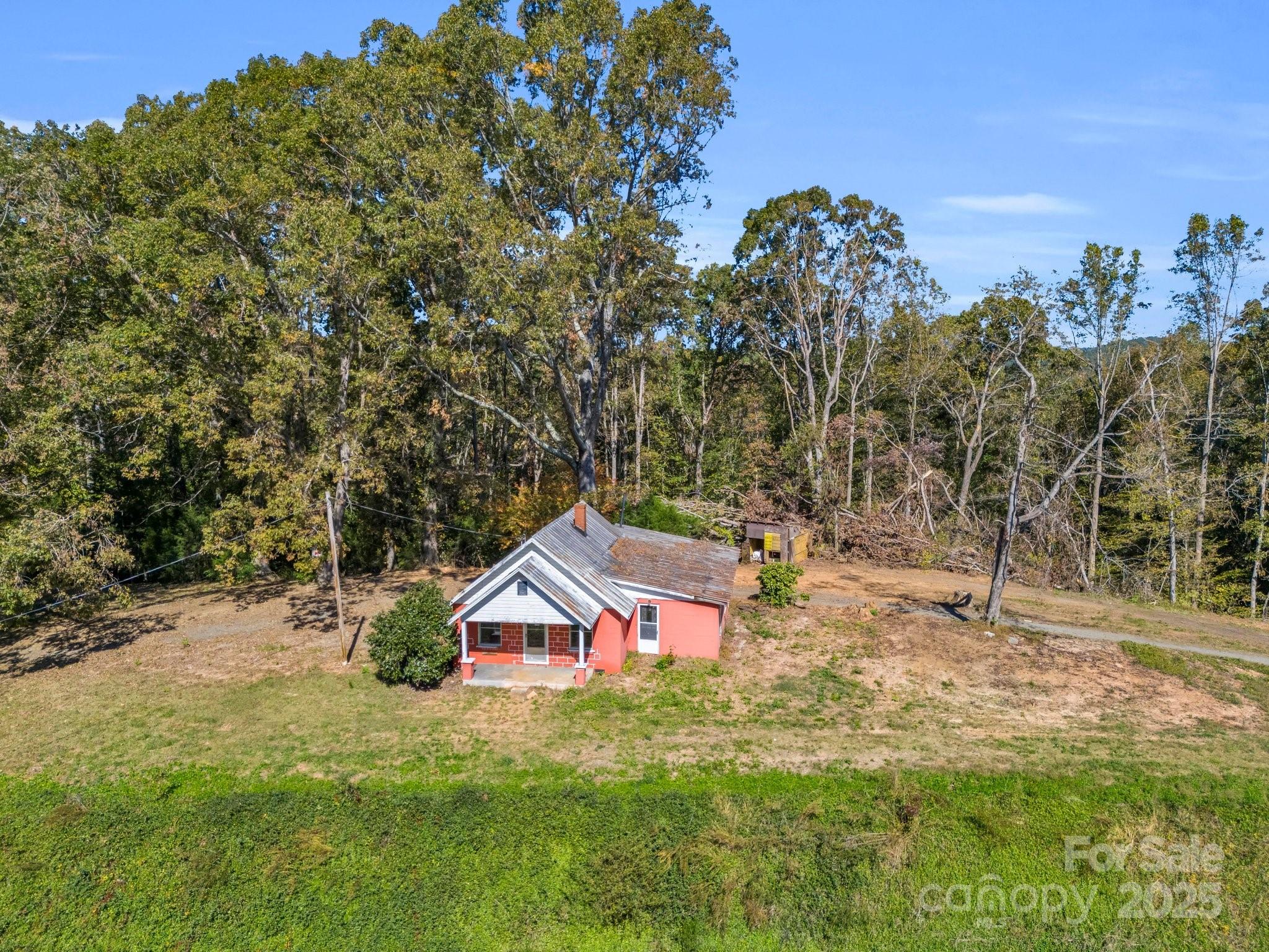 6271 Highway 108 Mill Spring, NC 28756 - Photo 32 of 35 a view of a tiny house with a yard