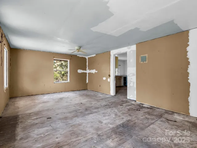 a kitchen with white cabinets