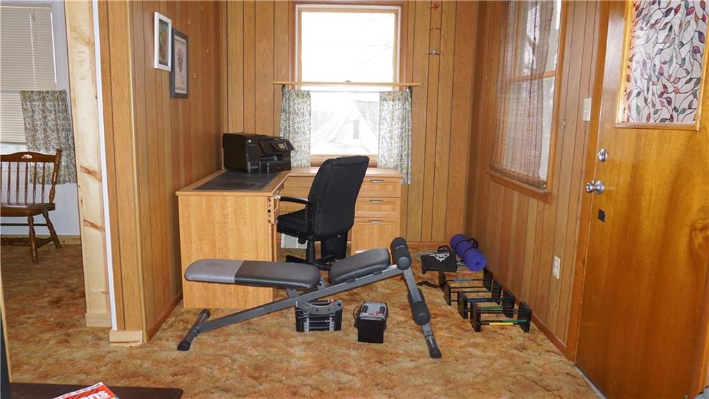 1414 Ridge Road Jeannette, PA 15644 - Photo 8 of 24 Front room of the home is also used as the Den and workout room