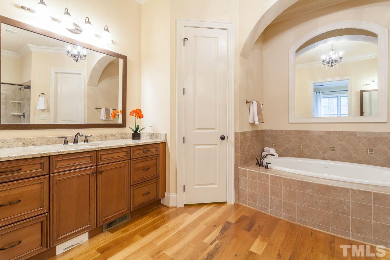 821 Keith Road Wake Forest, NC 27587 - Photo 12 of 25 You will appreciate the two large master vanities with granite counter tops and abundant storage.