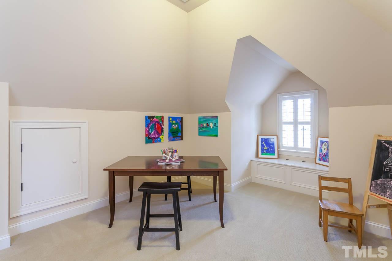821 Keith Road Wake Forest, NC 27587 - Photo 21 of 25 This versatile room off the bonus room is the perfect spot for crafts and hobbies. It would also make a wonderful homework retreat or exercise room. It features a window seat and plantation shutters.