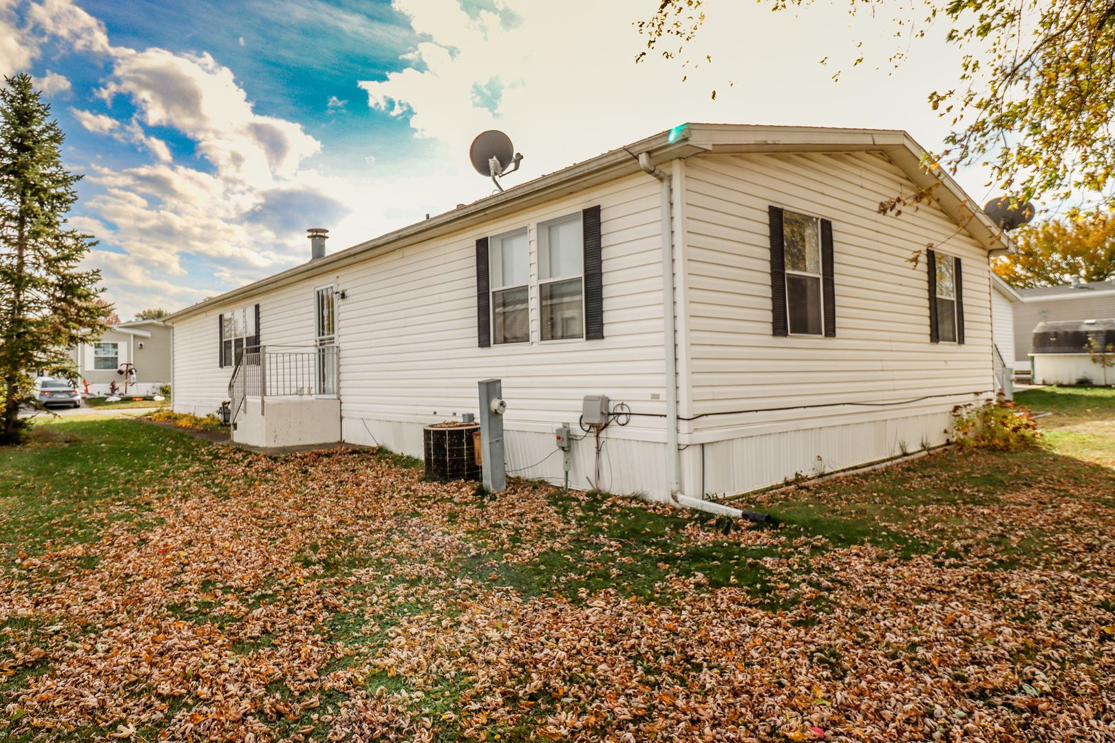 50 Cherry Lane Bourbonnais, IL 60914 - Photo 18 of 18 a front view of a house with a yard