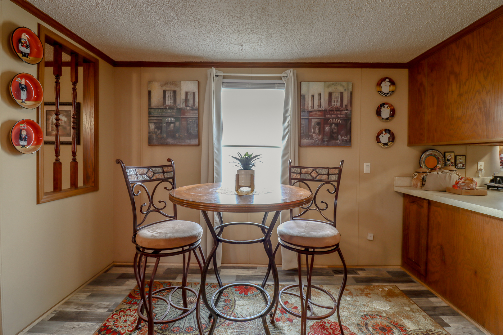 50 Cherry Lane Bourbonnais, IL 60914 - Photo 4 of 18 a view of a dining room with furniture and wooden floor