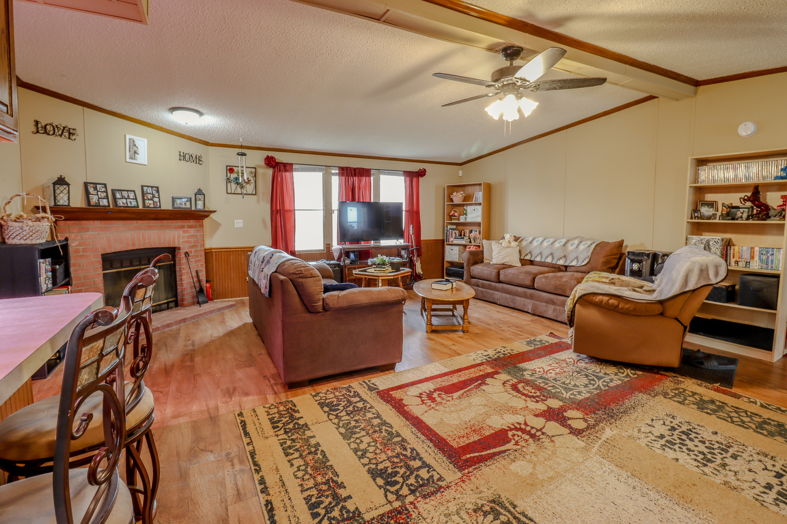 50 Cherry Lane Bourbonnais, IL 60914 - Photo 5 of 18 a living room with furniture and a fireplace