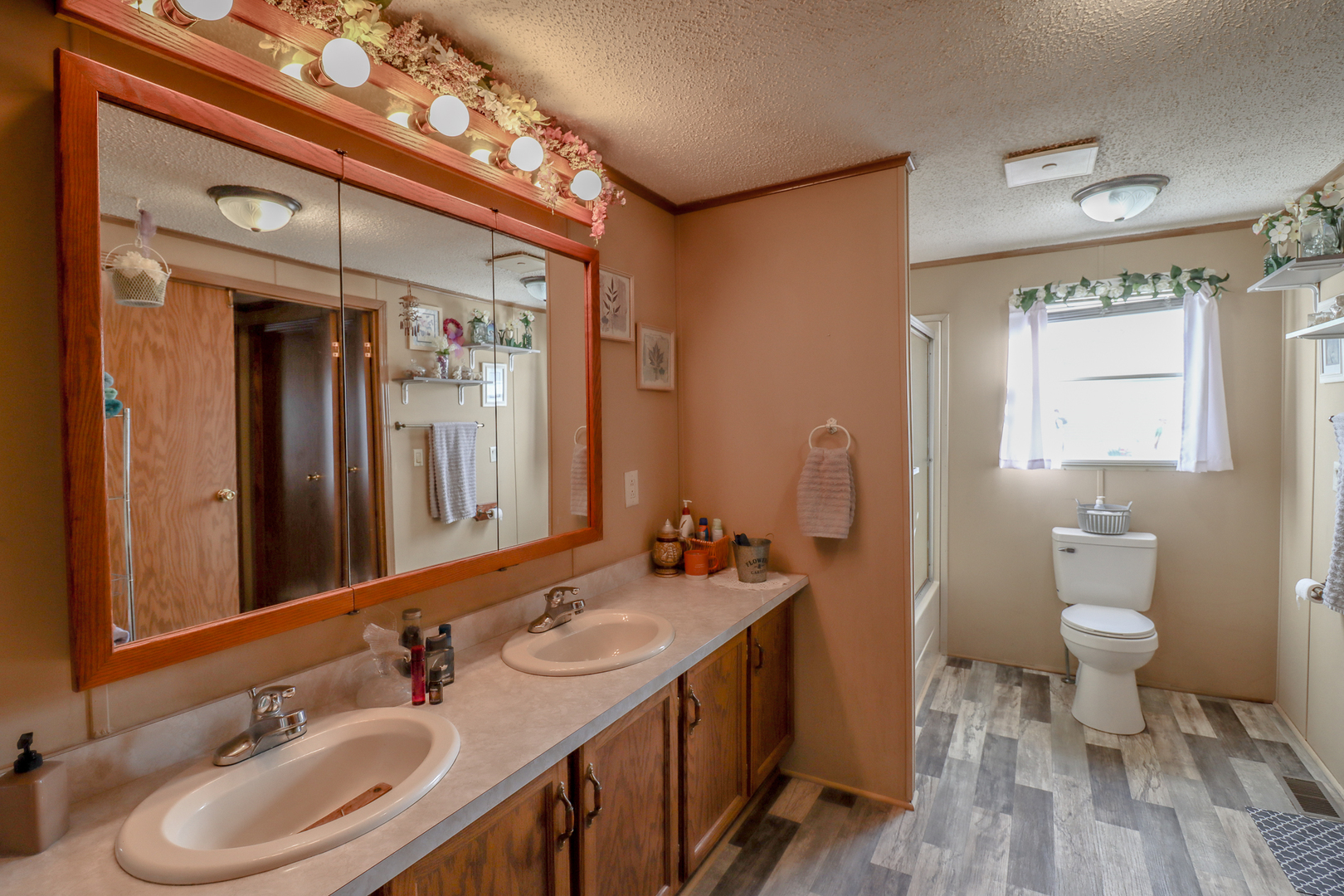50 Cherry Lane Bourbonnais, IL 60914 - Photo 8 of 18 a bathroom with a sink double vanity and a mirror