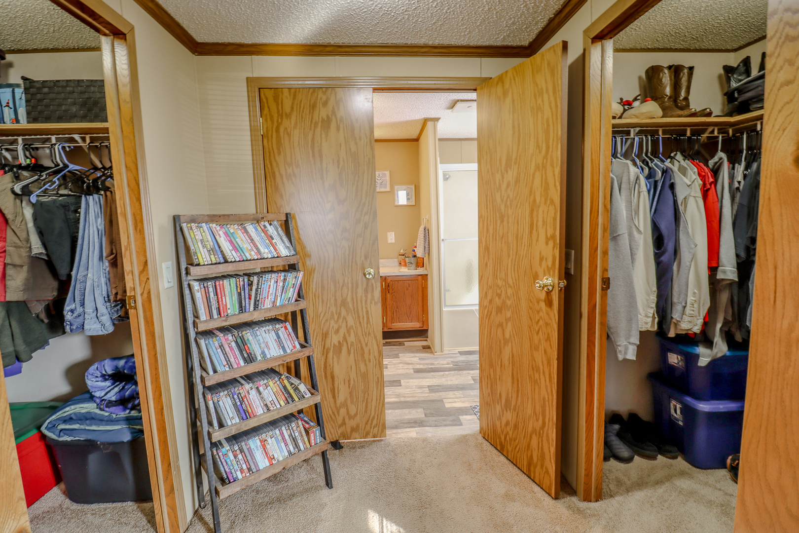 50 Cherry Lane Bourbonnais, IL 60914 - Photo 10 of 18 a view of walk in closet with clothes and shoes