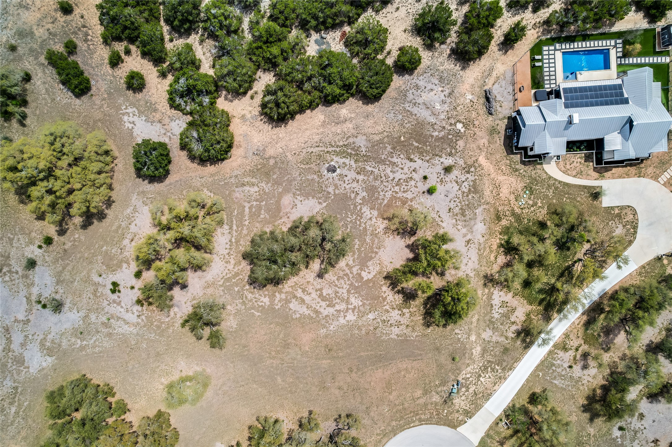 285 Calvary Cove Dripping Springs, TX 78620 - Photo 15 of 17 a view of a backyard of a house