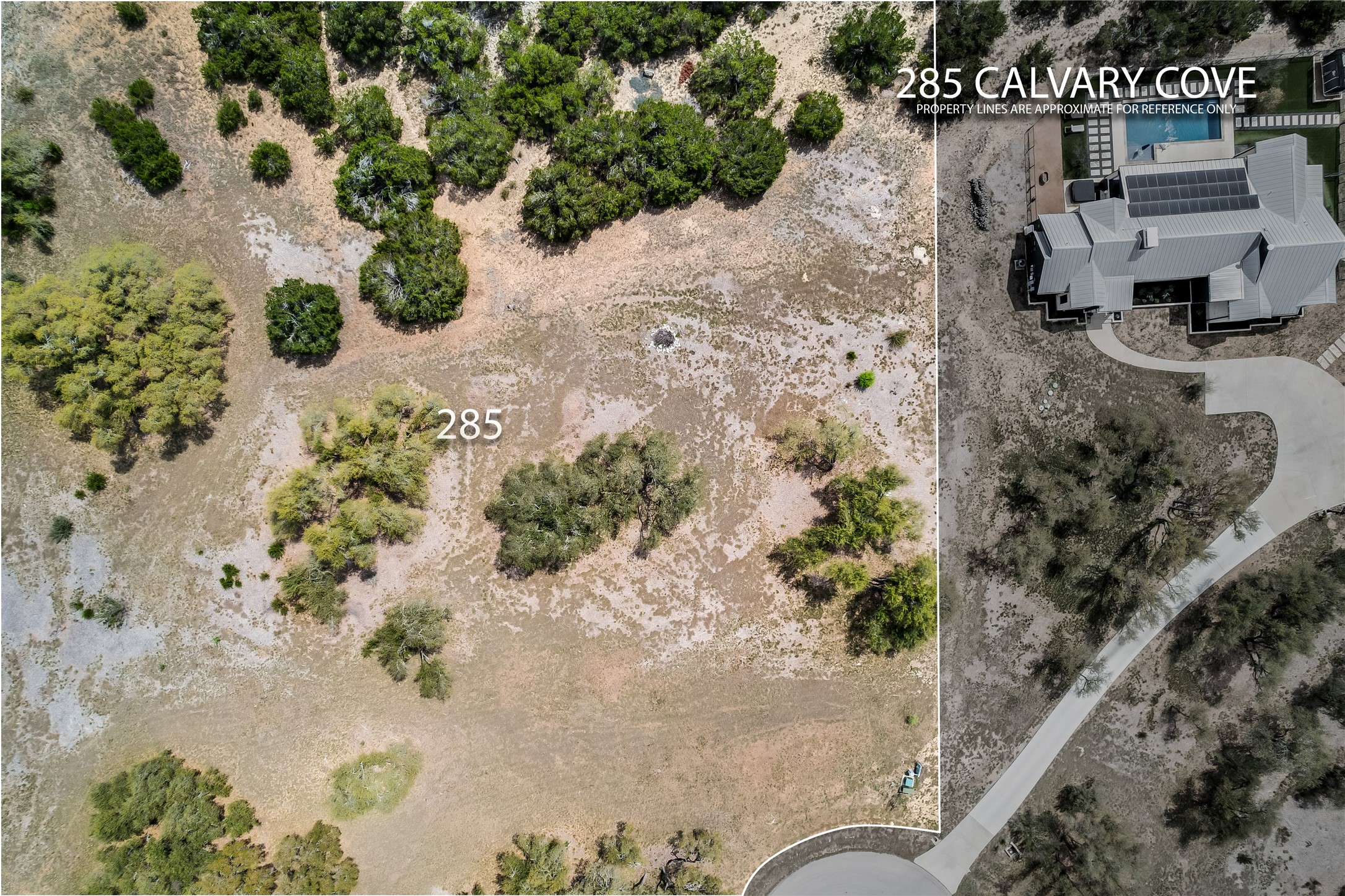 285 Calvary Cove Dripping Springs, TX 78620 - Photo 16 of 17 a view of a house with a yard