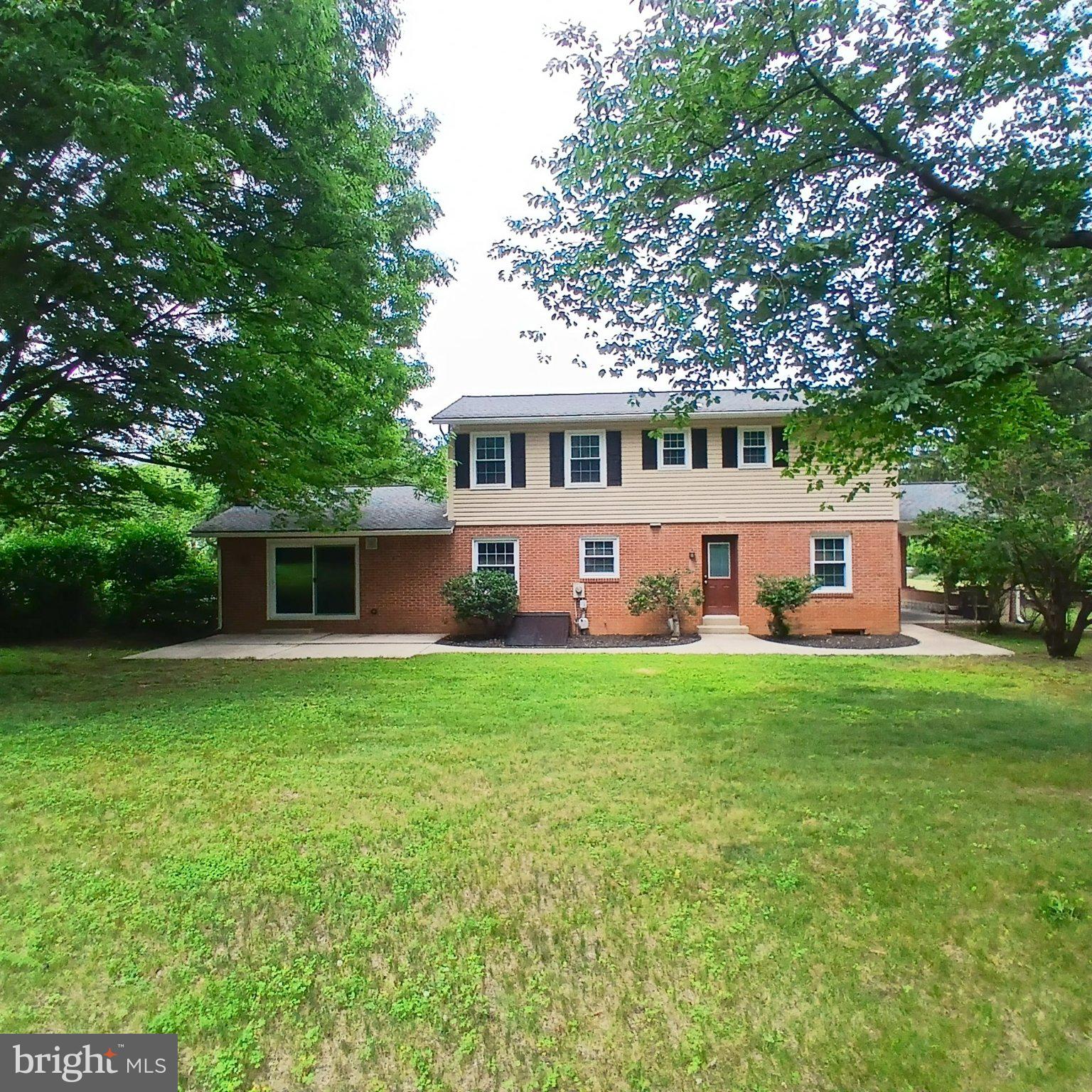 7007 Runnymeade Court Frederick, MD 21702 - Photo 37 of 37 Charming brick home in lush greenery.